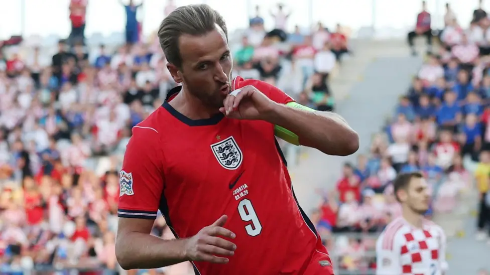 England forward Harry Kane celebrating after scoring against Croatia.