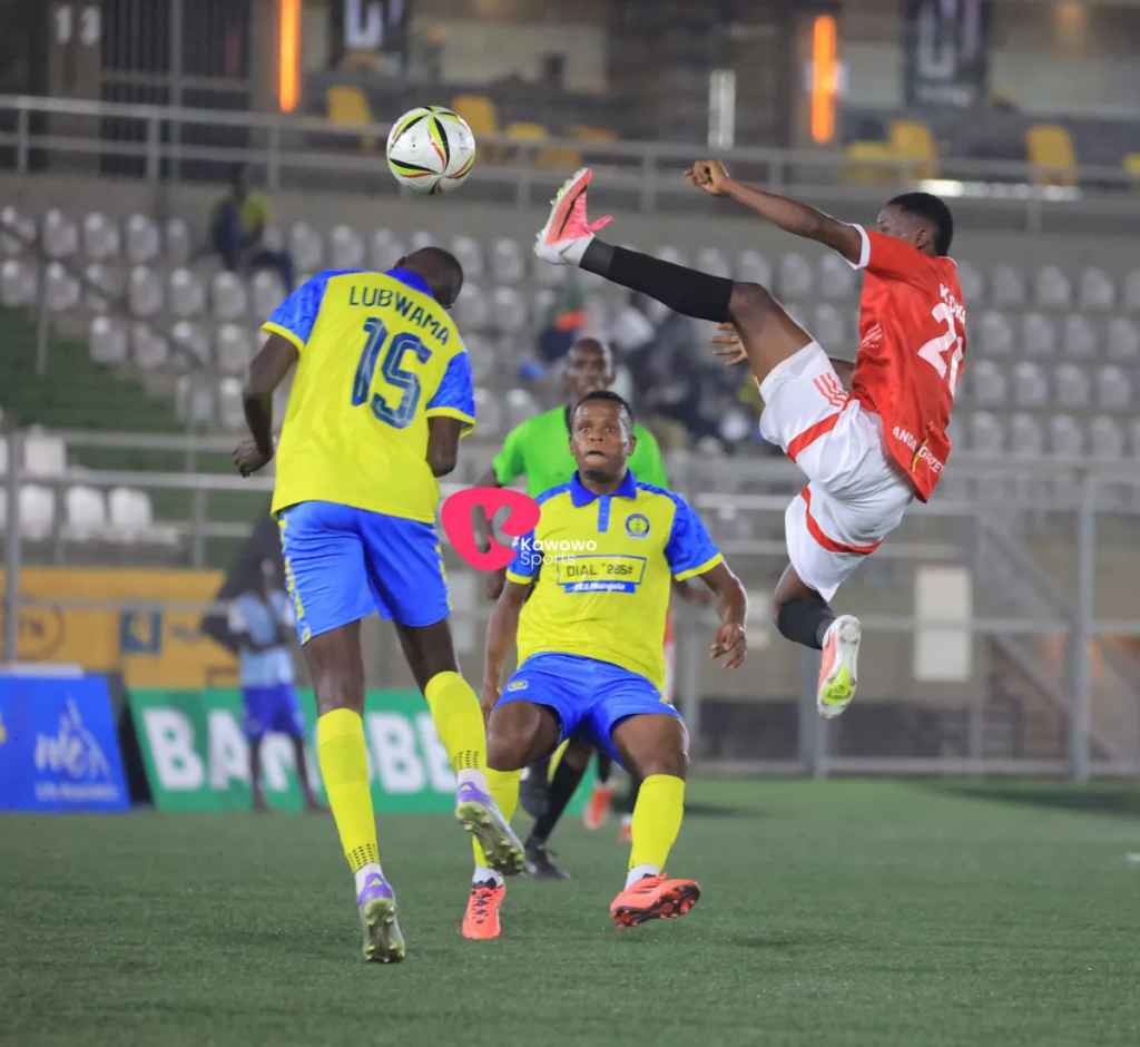 Players from URA and Entebbe UPPC in action during their match at Hamz Stadium.