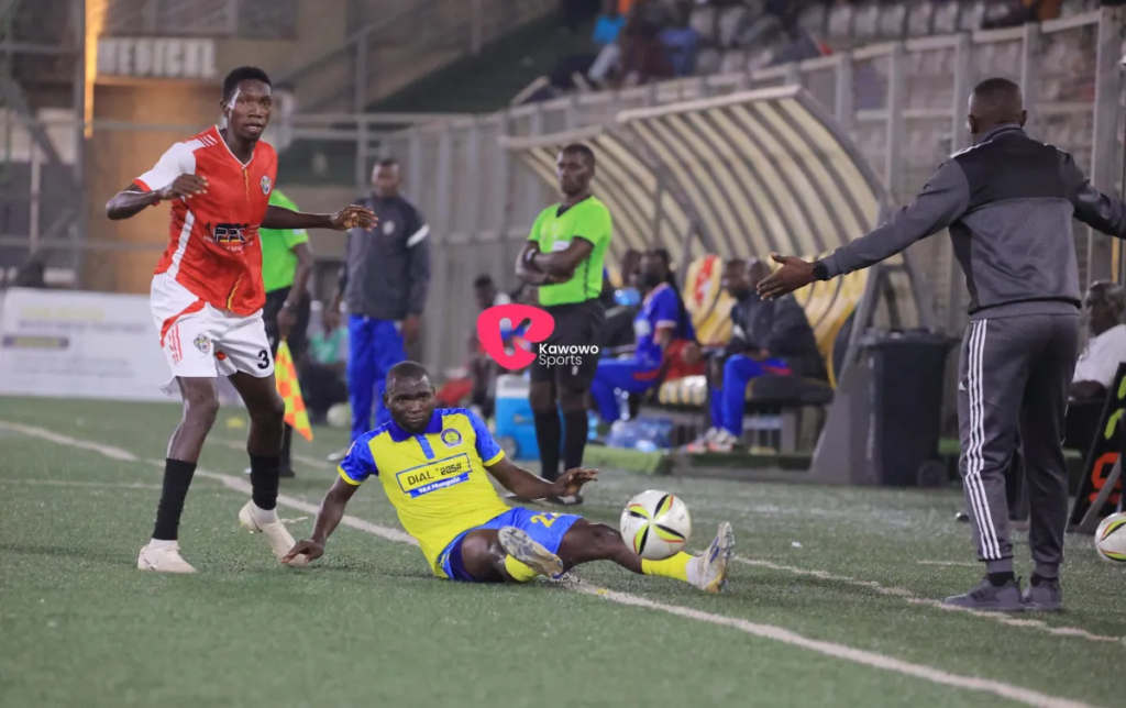 Players from URA and Entebbe UPPC challenging for the ball during their match at Hamz Stadium.