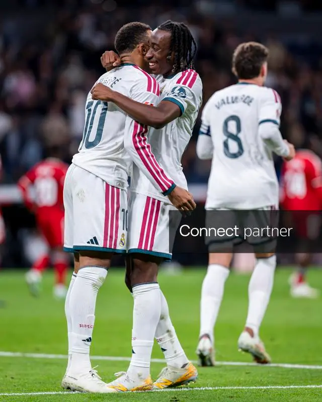 Kylian Mbappé and Yan Diomande celebrate against Sevilla.